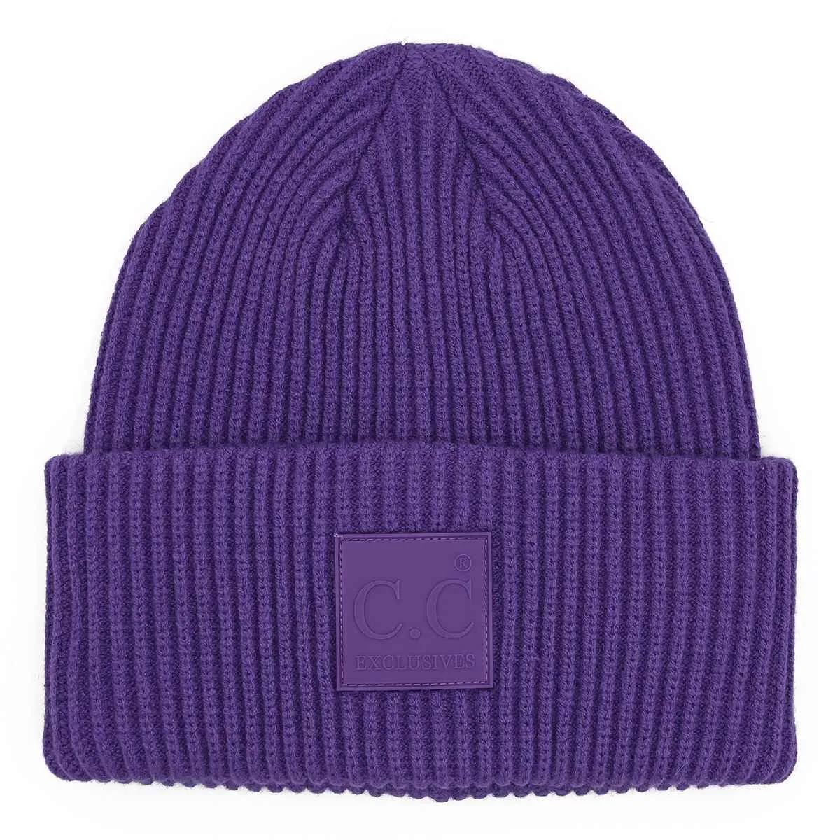 HAT7007 Solid Ribbed Beanie With Rubber Patch